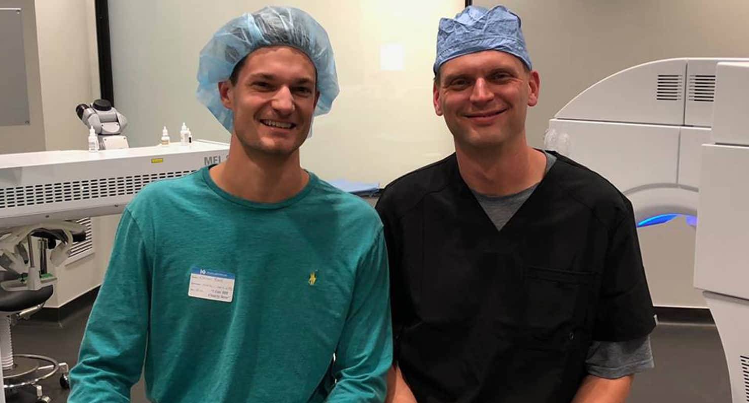 Dr. Kugler and a happy patient smiling- day of LASIK photo.