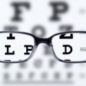 glasses over eye chart