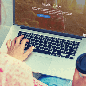 woman looking at kugler vision website on laptop