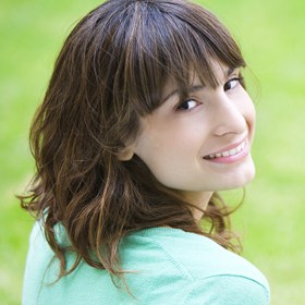woman outside smiling
