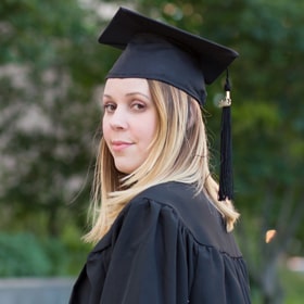 graduate in cap and gown