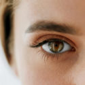 close up on woman with a brown eye