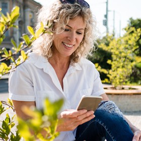 woman on smart phone outside