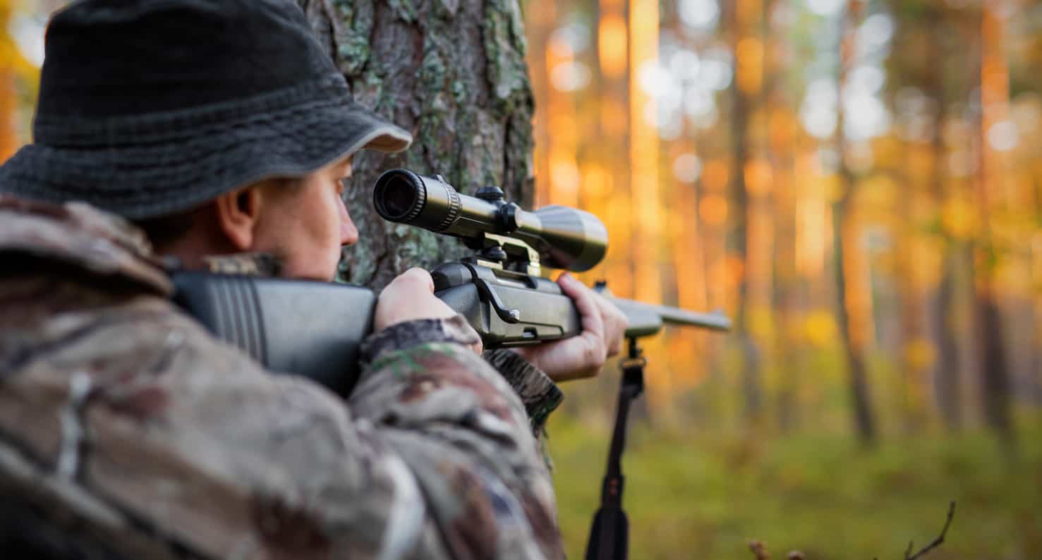 hunter outside with gun