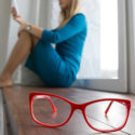 reading glasses with woman on smart phone