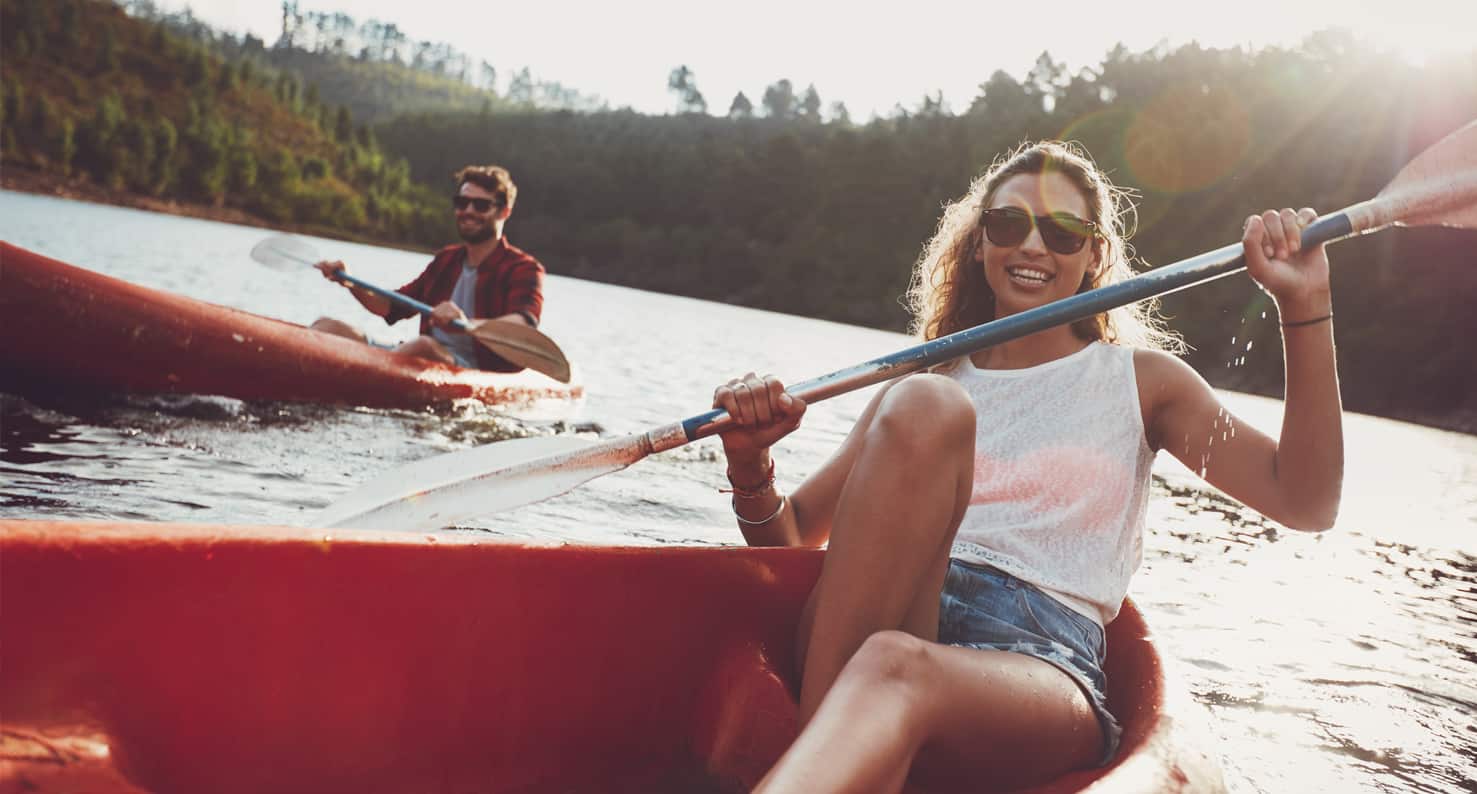 young couple on lake