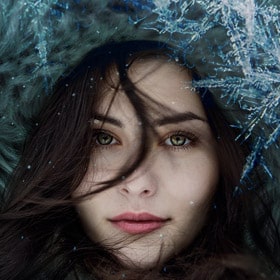 a woman in a parka in winter