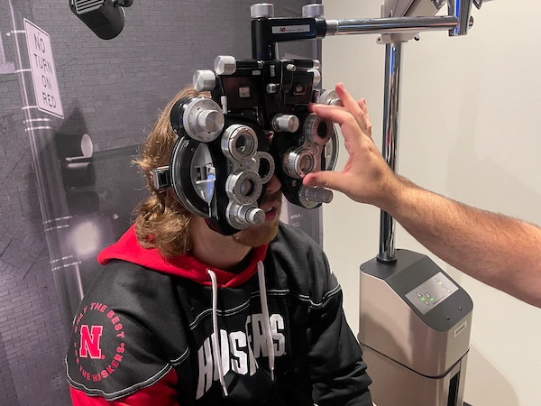 Husker linebacker Nick Henrich undergoes VisionTrack Assessment at Kugler Vision as a part of his LASIK vision upgrade.